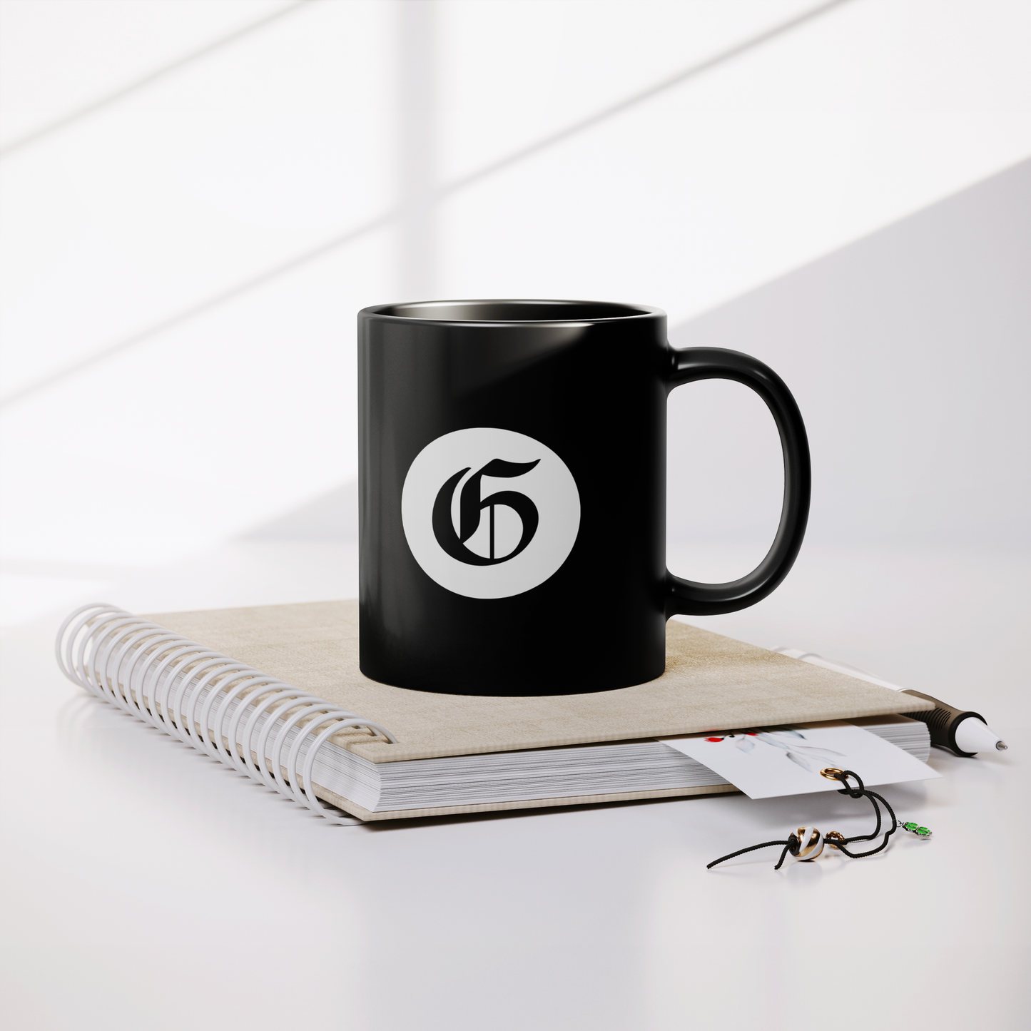 Gazette_Circle_Mug_Lifestyle_Notebook_Mockup.png