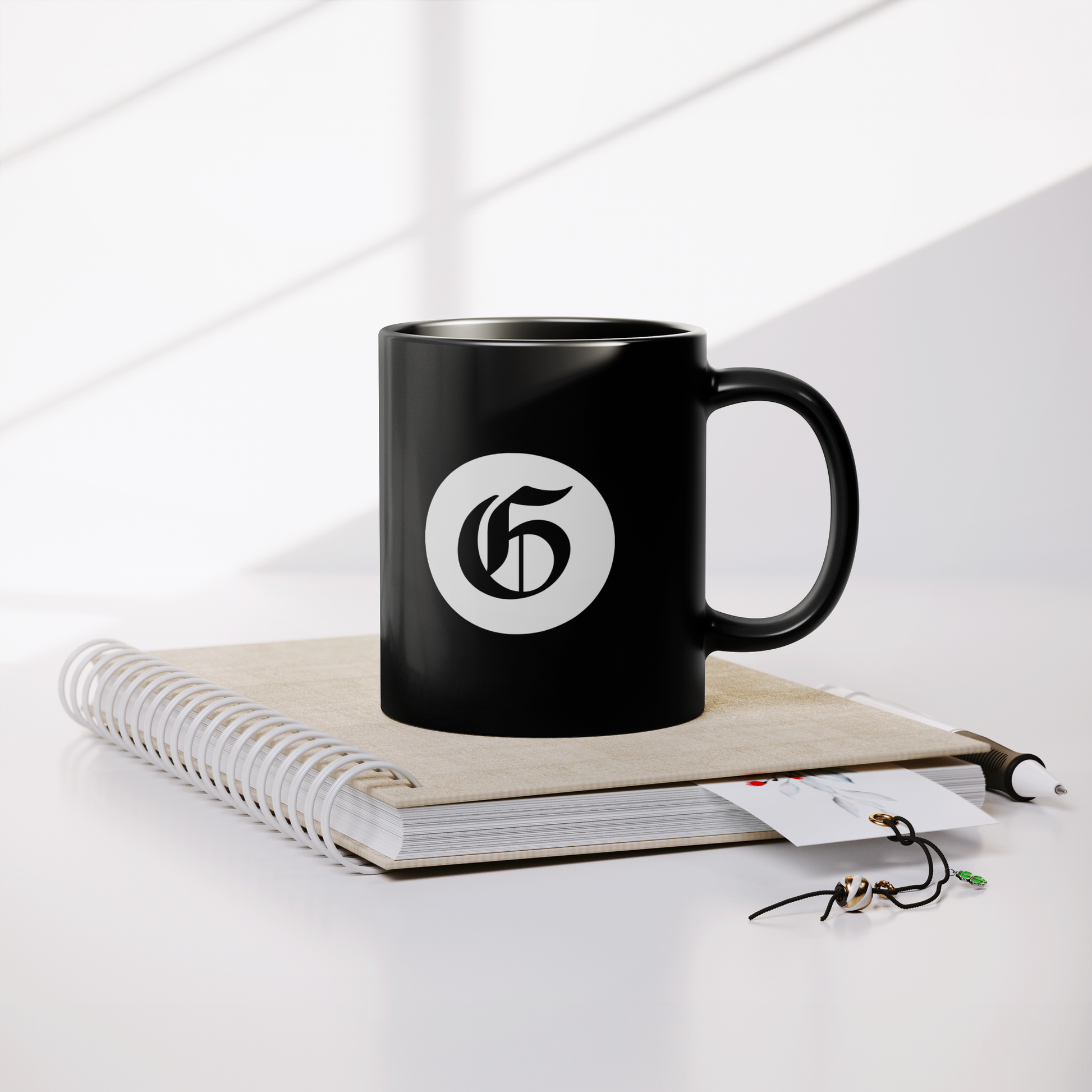 Gazette_Circle_Mug_Lifestyle_Notebook_Mockup.png